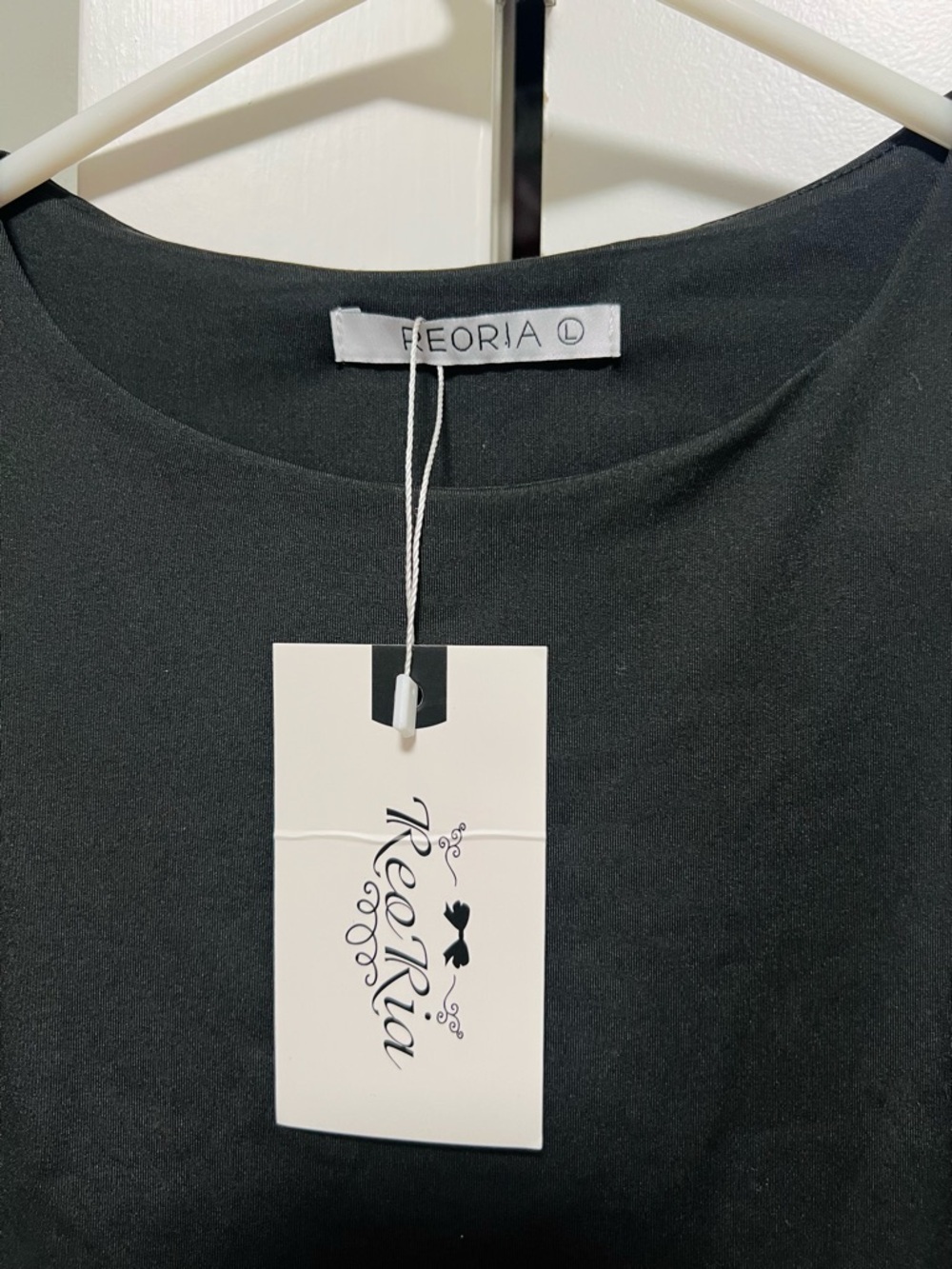 ReoRia Black Crewneck Sleeveless Bodysuit - Picture 2 of 3